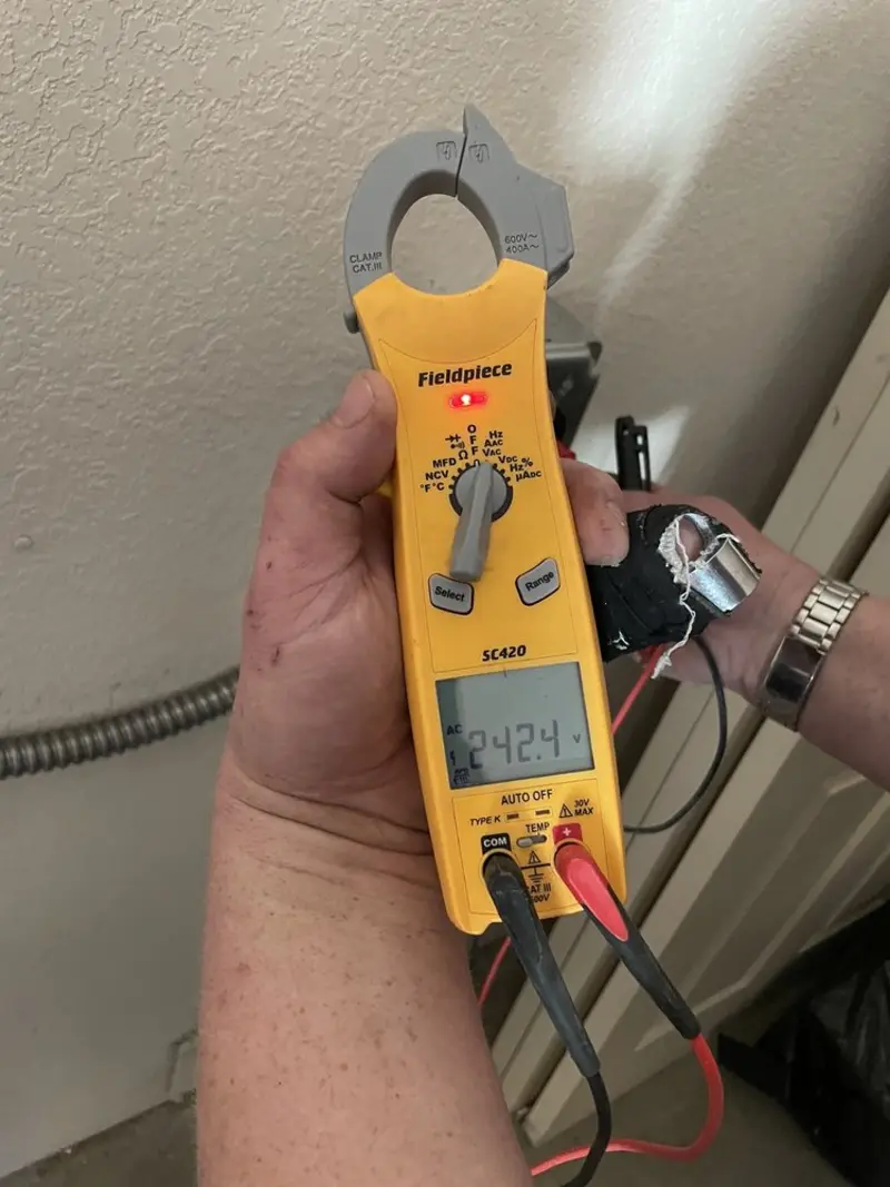 Voltage testing with clamp meter during Hot Tub / Pool Electrical Wiring in Moss Point